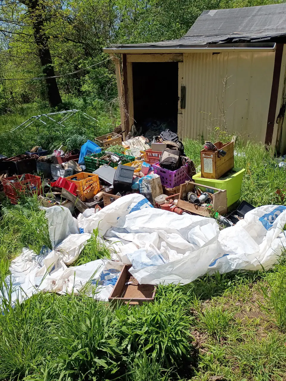 Unwanted materials outside an outbuilding